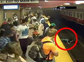 Woman and Child Fall on Train Tracks - Watch the Heroic Outcome
