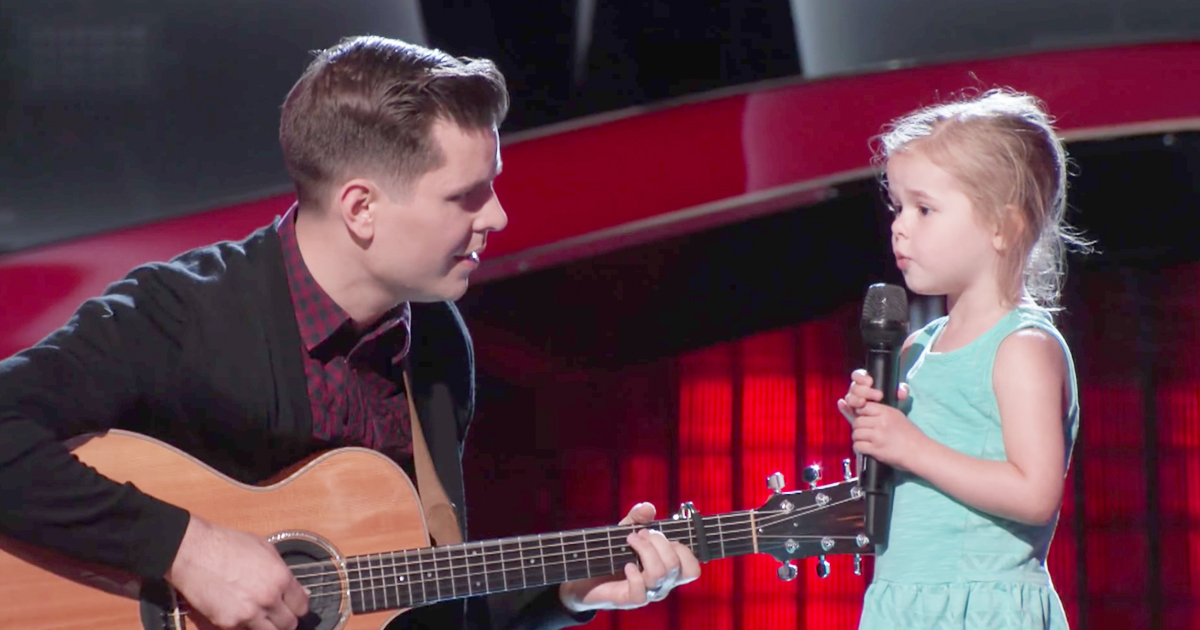 Little Girl Adorably Upstages Dad's Singing Audition On The Voice 